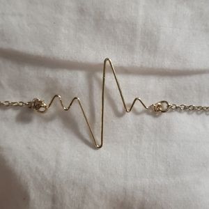Gold tone medical heartbeat bracelet